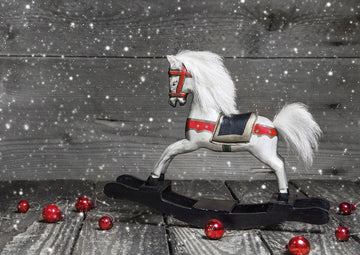 Postkarte zu Weihnachten weißes Schaukelpferd