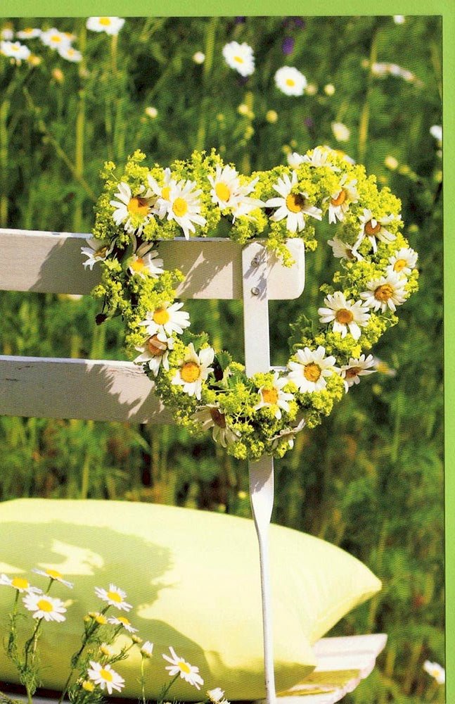 Grußkarte ohne Text Gänseblümchen Herz Stuhl Garten